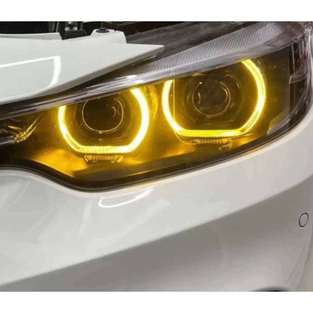 BMW G30 G31 G32 GT F90 2017-2023 CT Carbon yellow adaptive DRL module set installed on vehicle front.