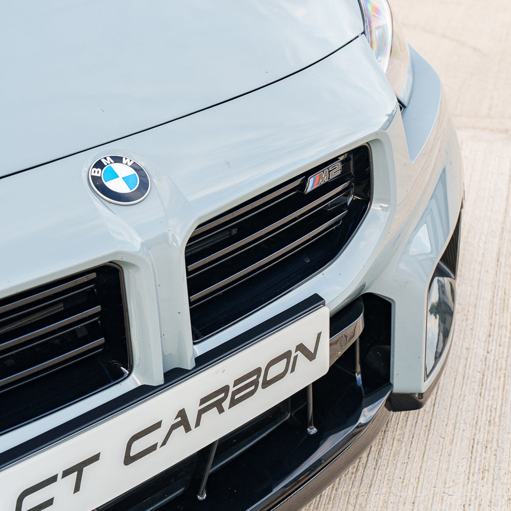 BMW G87 M2 full carbon fiber kit by CT Carbon, featuring sleek, lightweight carbon components for enhanced style and performance.