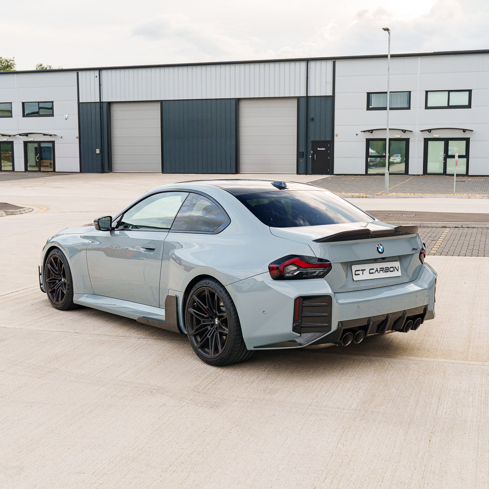 BMW G87 M2 full carbon fiber kit by CT Carbon, featuring aerodynamic components and sleek carbon fiber finish.