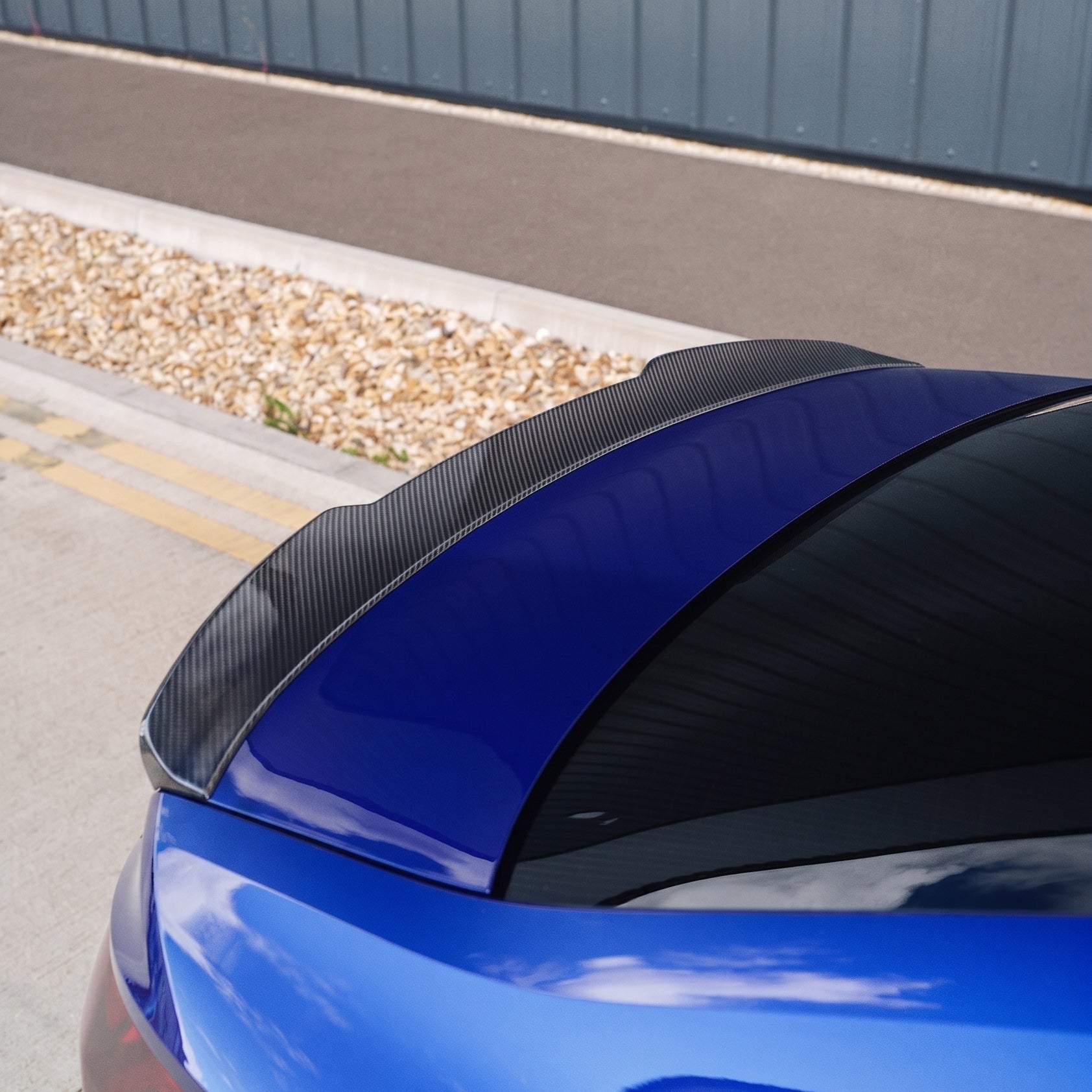 Carbon fiber spoiler for Audi A3/S3/RS3 8Y saloon, 2022+ model, by CT Carbon, shown on a sleek vehicle.