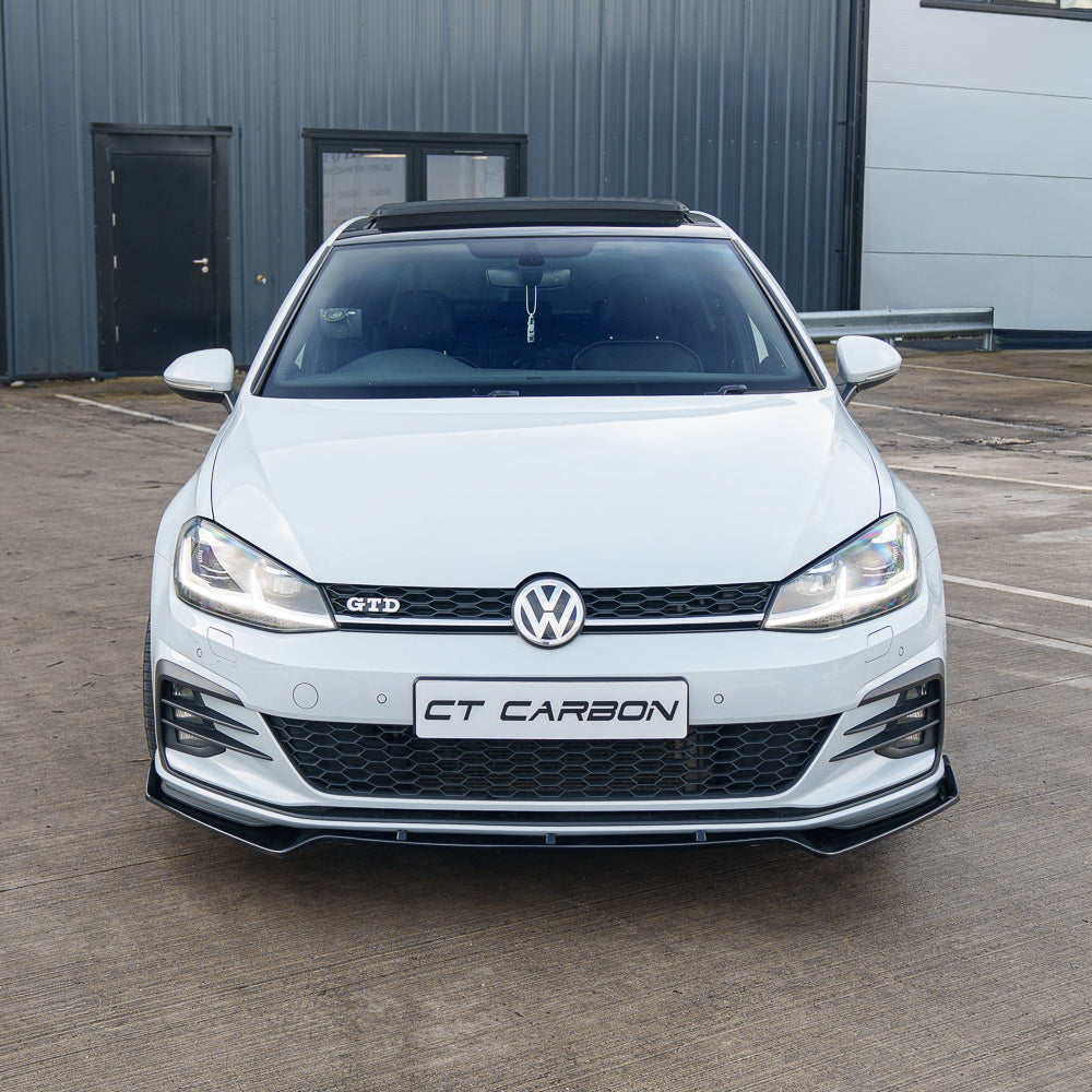 Gloss black splitter for Volkswagen Golf MK7/7.5 GTI, R, GTS by CT Carbon, installed on the front bumper.