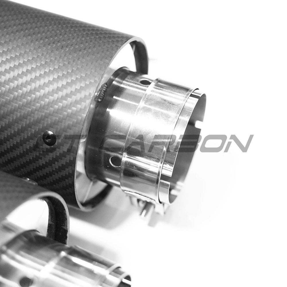 Hyundai i30N car with CT Carbon fiber exhaust tips installed, showcasing sleek, glossy black finish on the exhaust outlets.