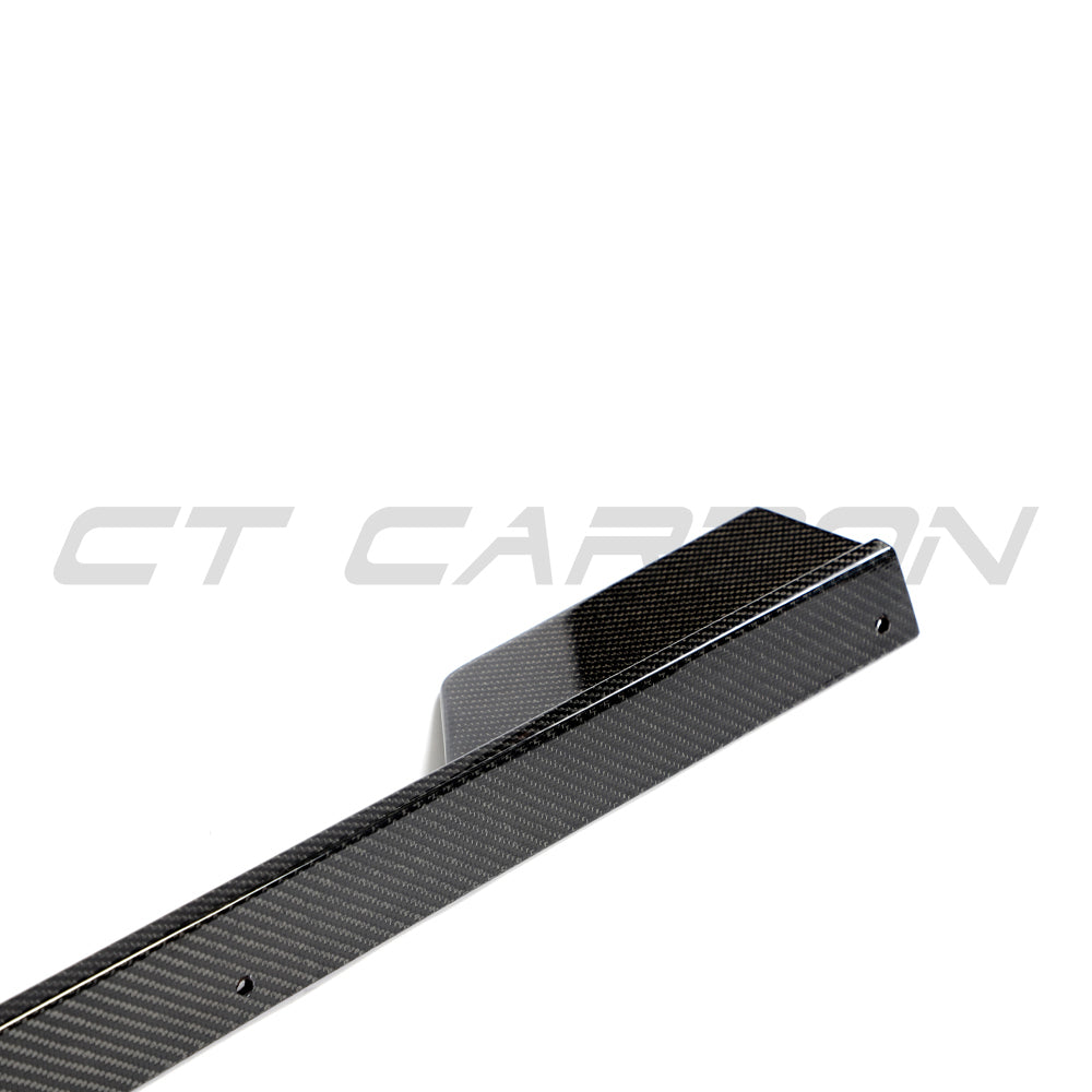 Hyundai i30N carbon fiber side skirts by CT Design, showcasing sleek, lightweight aerodynamic enhancements on the car's sides.