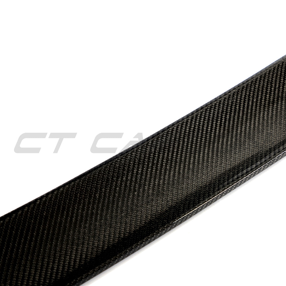 Hyundai i30N carbon fibre spoiler by CT Design, showcasing sleek, aerodynamic design and glossy carbon fiber finish.