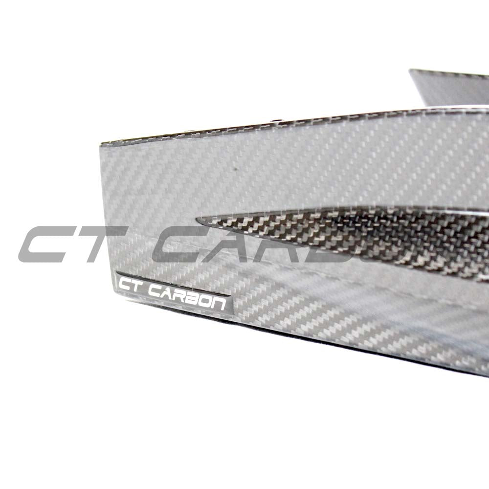 BMW M3 G80/G81 carbon fibre rear bumper corners by CT Carbon, showcasing sleek, lightweight automotive accessories.