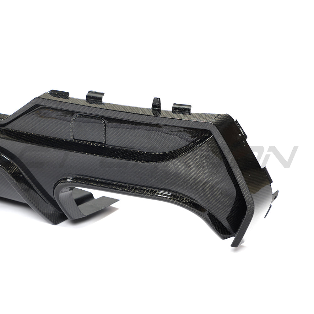 BMW G23 4 Series Convertible 2020+ CT Carbon V3 carbon fibre kit installed, showcasing sleek black carbon fibre panels on the car.
