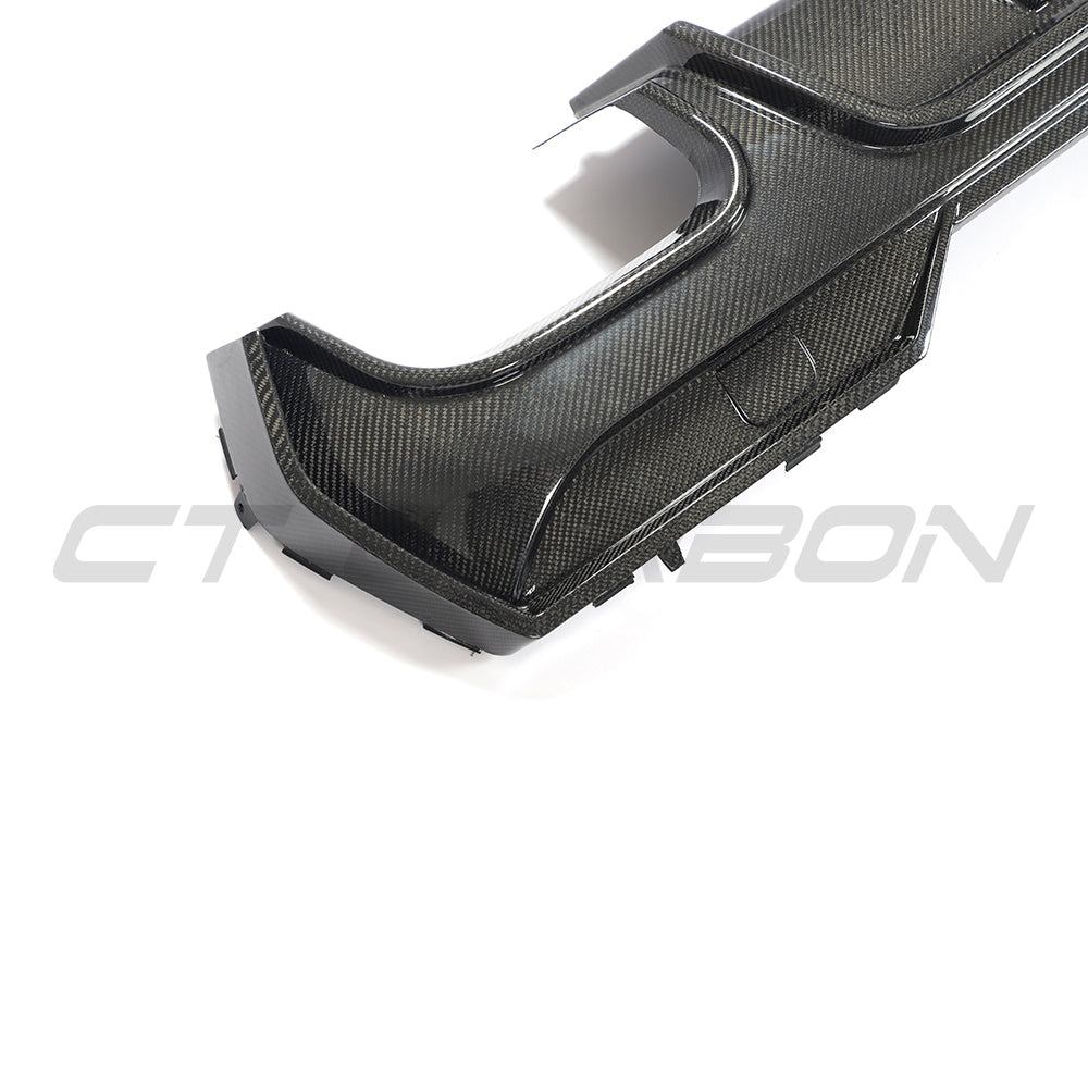 BMW G22 4 Series 2020+ carbon fibre kit by CT Carbon, featuring lightweight, textured carbon fibre parts for enhanced vehicle style.