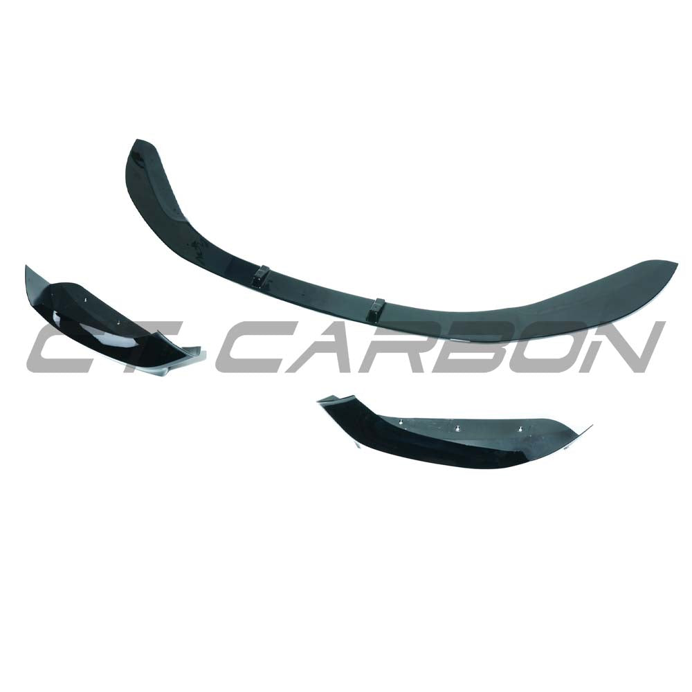 BMW F20/F21 1 Series LCI twin left gloss black kit by CT Carbon, showing sleek carbon fiber accents on a car.