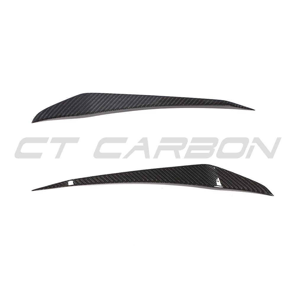CT Carbon Porsche 911 991.1 Turbo carbon fiber canards for aerodynamic accessories, shown on the front of the car.