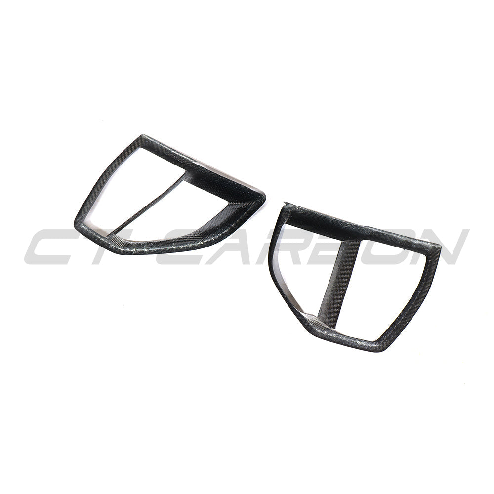 BMW G05 X5 2019-2023 carbon fiber front vent add-on accessory by CT Carbon, featuring sleek, textured carbon fiber design.