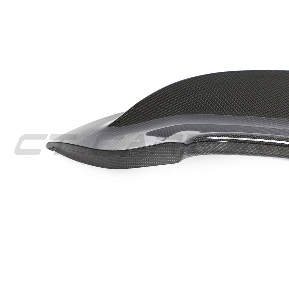 CT Carbon Porsche 992 Carrera GTS 2018+ carbon fiber replacement ducktail spoiler mounted on a sports car.