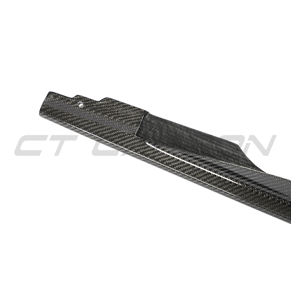 CT Carbon side skirts for VW Golf MK8/MK8.5 R 2020+ with carbon fibre finish, showcasing sleek, aerodynamic design on the vehicle.