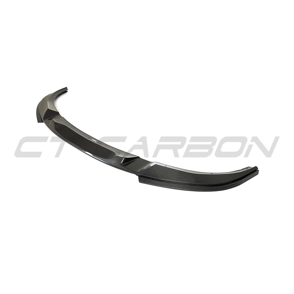 BMW 4 Series G26 and i4 carbon fibre splitter by CT Carbon, V2, showing its sleek aerodynamic design and textured finish.