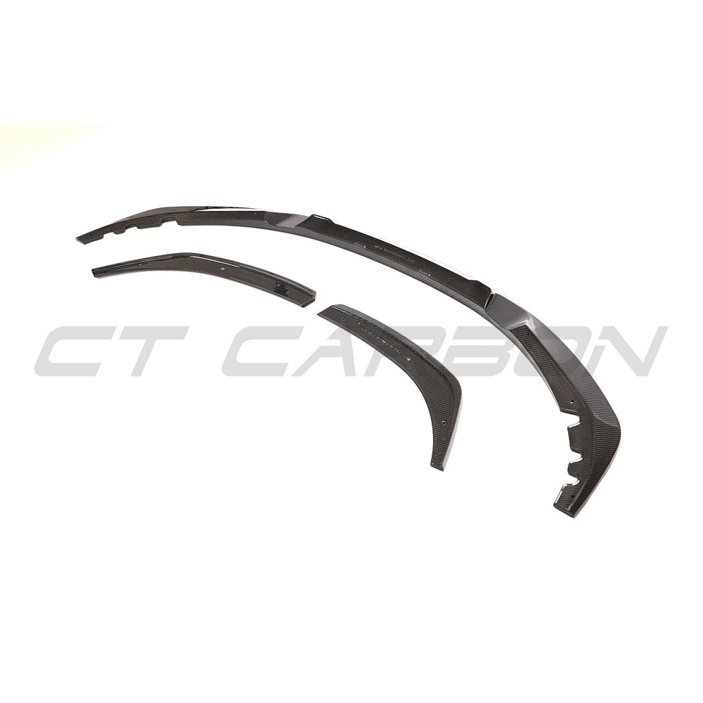 BMW 4 Series G22 G23 carbon fibre splitter by CT Carbon, V2, showing aerodynamic design and textured carbon finish.
