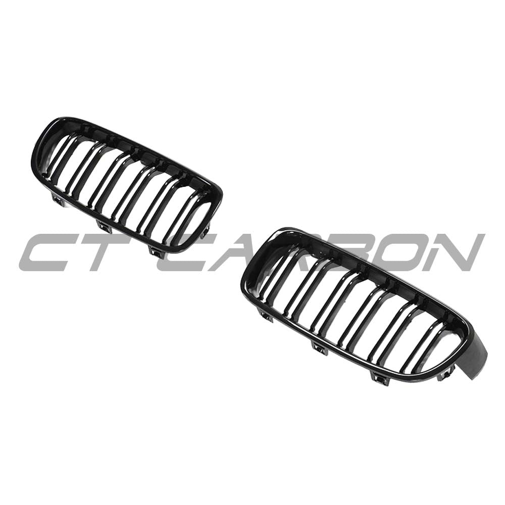 BMW F30/F31 3 Series black double slat grille by CT Carbon, close-up view showing sleek design and glossy finish.