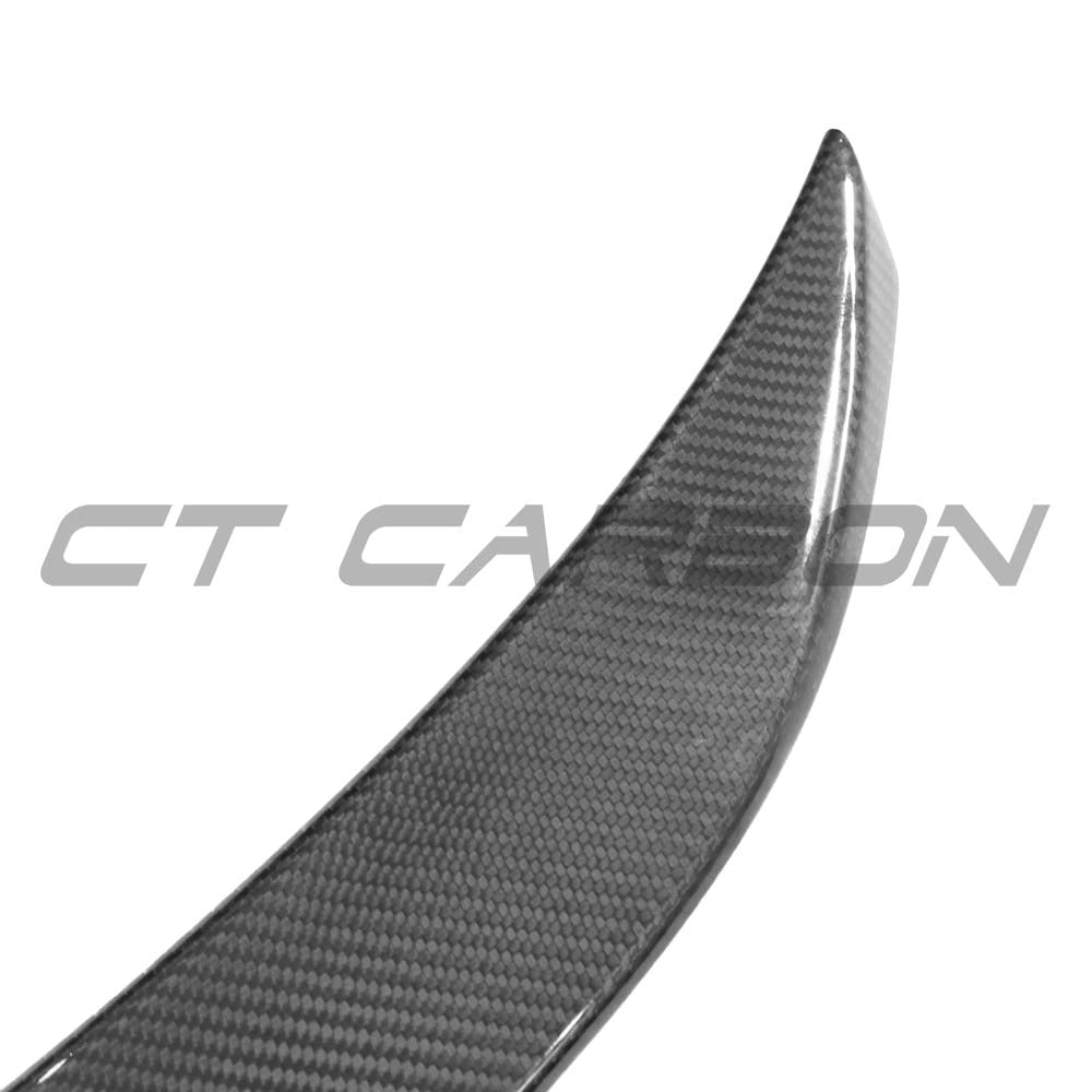 BMW 3 Series G80/G20 carbon fiber spoiler by CT Carbon, front view showing sleek, aerodynamic design on vehicle.