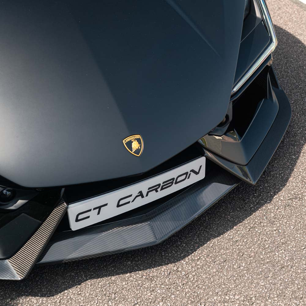 Lamborghini Revueltо full carbon fibre kit by CT Carbon, showing detailed carbon fibre panels and sleek automotive design.