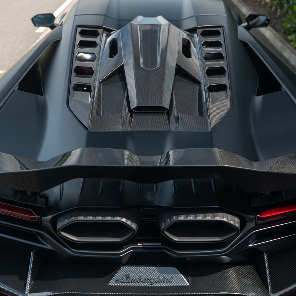 Lamborghini Revuelto full carbon fiber kit by CT Design, featuring sleek carbon fiber panels and aerodynamic enhancements.