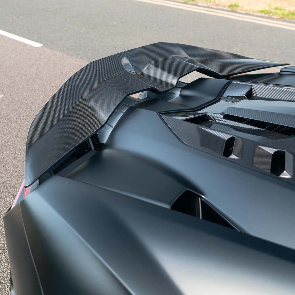 Lamborghini Revetuto full carbon fiber kit by CT Carbon, featuring sleek, lightweight carbon fiber components for high-performance sports car.