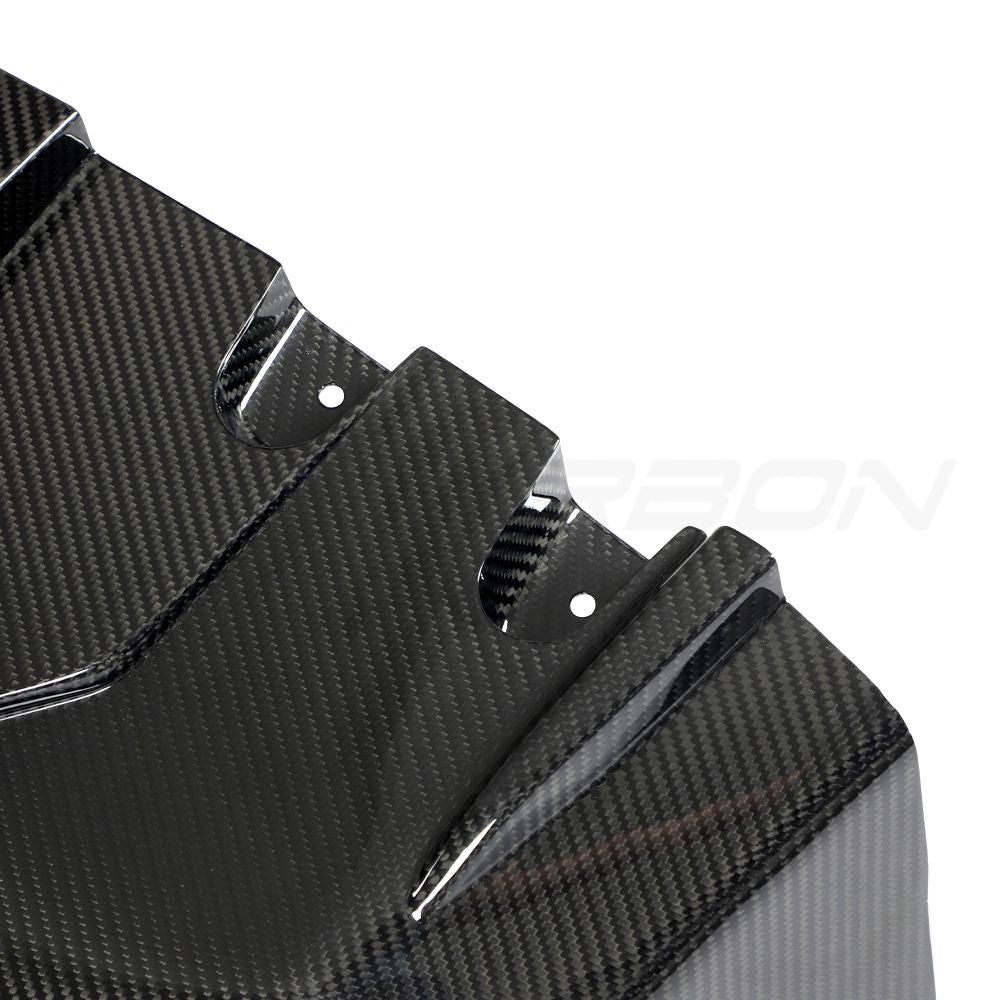 Lamborghini Huracan LP-610 carbon fiber diffuser by CT Carbon, showcasing sleek, aerodynamic design and textured carbon fiber surface.