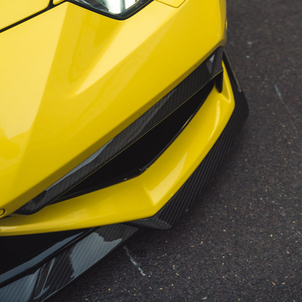 Lamborghini Huracan LP-610 carbon fibre front bumper trim accessory by CT Carbon, showcasing sleek, aerodynamic design.