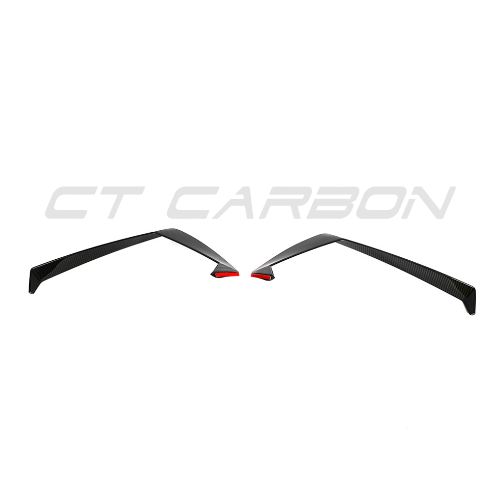 Lamborghini Huracan LP-610 carbon fibre front bumper trim accessory by CT Carbon, showing detailed textured carbon fibre surface.