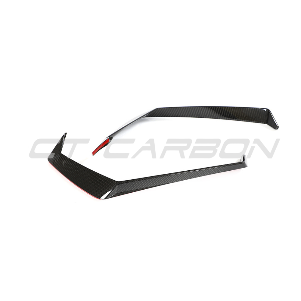 Lamborghini Huracan LP-610 front bumper trim in carbon fibre by CT Design, close-up view of sleek, lightweight car accessory.