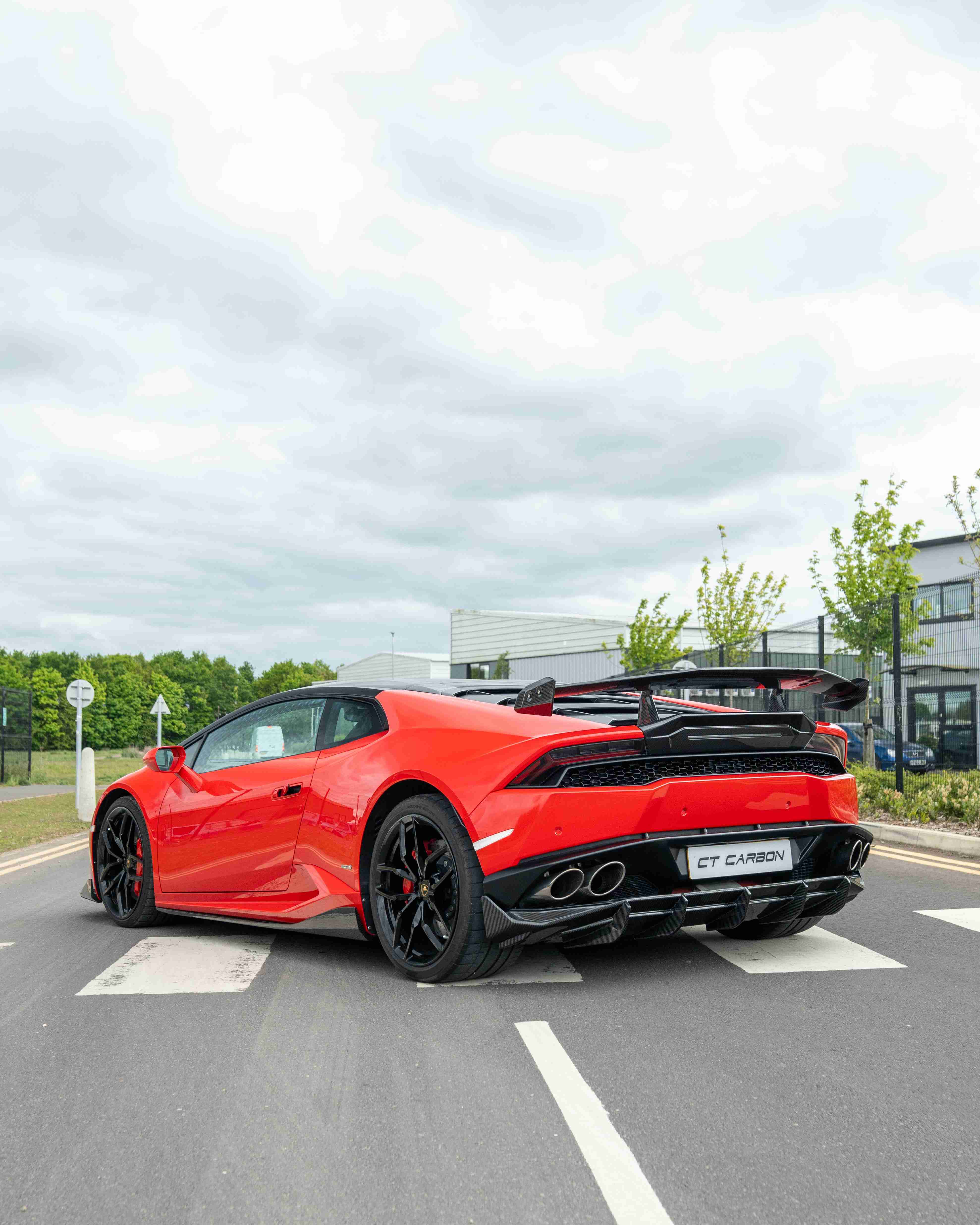 Lamborghini Huracan LP-610 carbon fibre full kit by CT Carbon, showing detailed panels and aerodynamic design on the car.