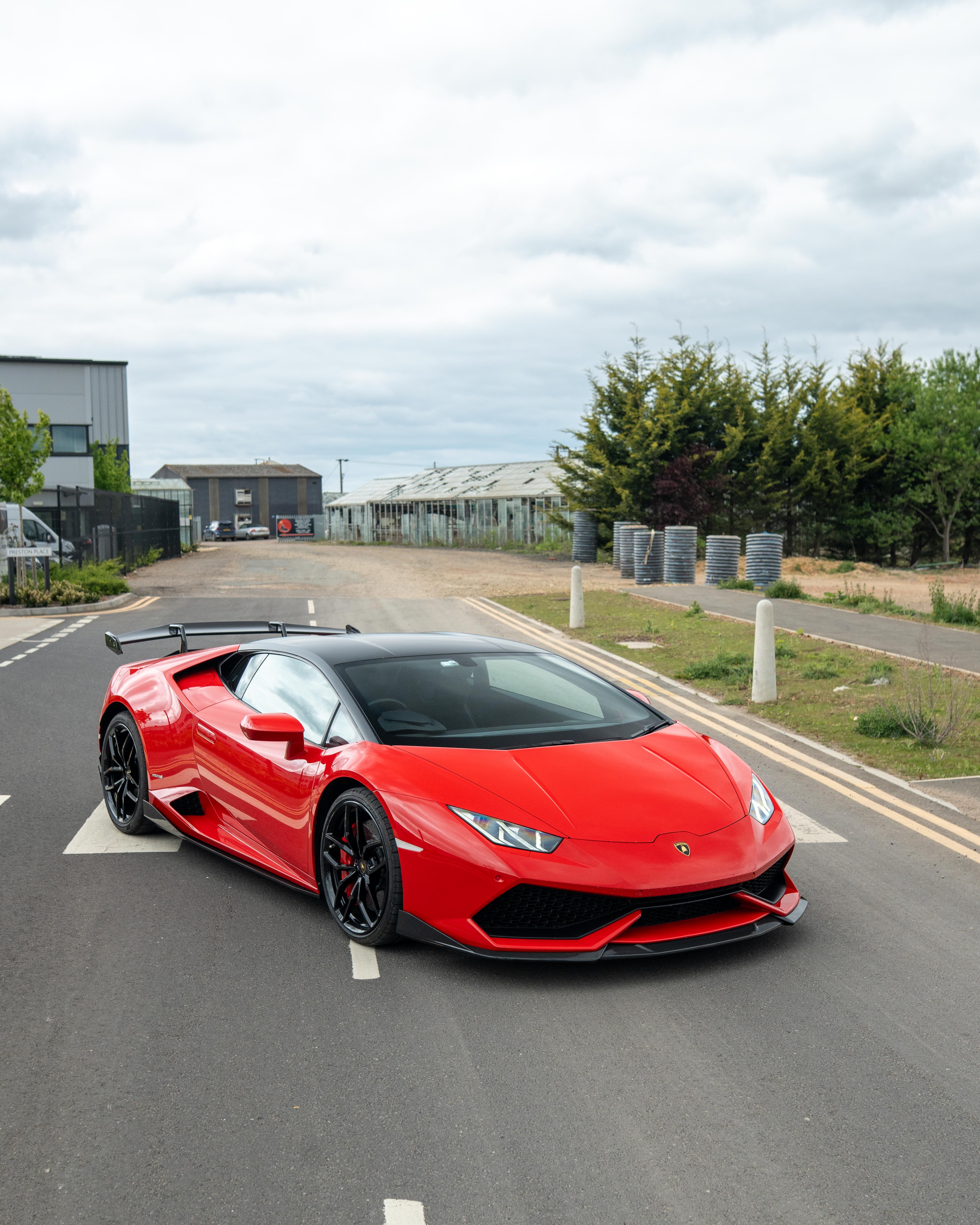 Lamborghini Huracan LP-610 carbon fibre splitter by CT Design, showing a sleek aerodynamic front splitter with detailed carbon fibre finish.