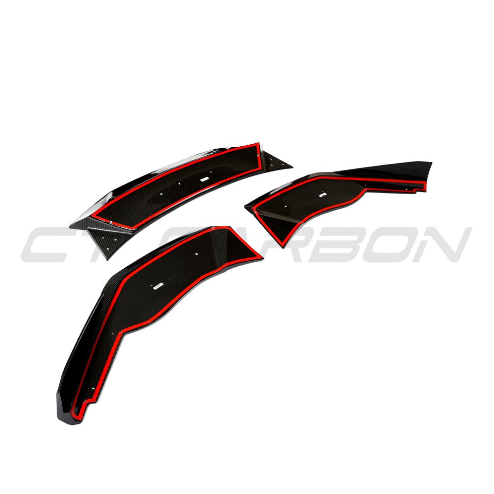 Lamborghini Huracan LP-610 carbon fibre splitter by CT Design, close-up view showing aerodynamic design and carbon fibre texture.