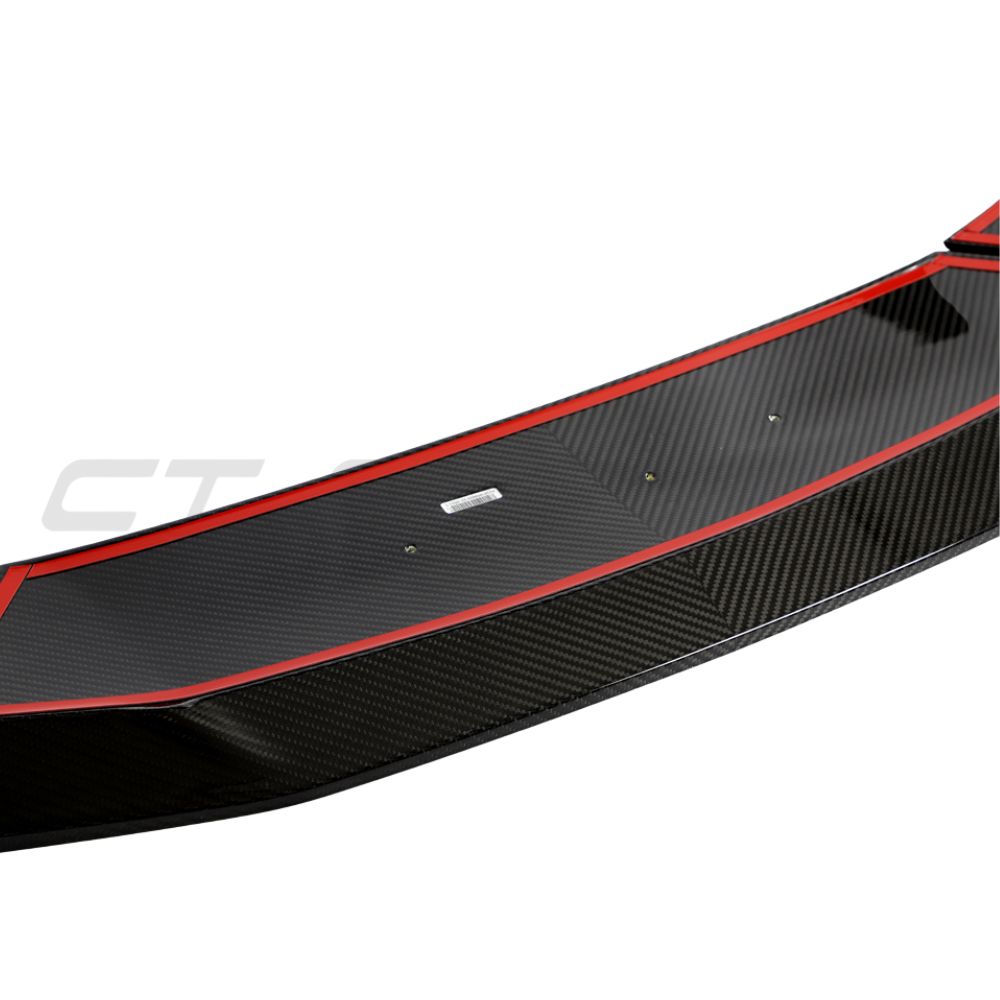 Lamborghini Huracan LP-610 carbon fibre splitter by CT Design, close-up view showing sleek, lightweight aerodynamic car accessory.