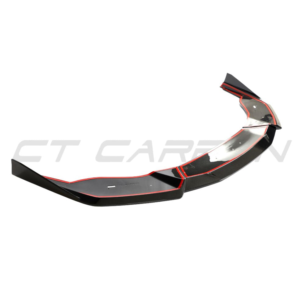 Lamborghini Huracan LP-610 carbon fibre splitter by CT Design mounted on the front of the sports car, showcasing sleek aerodynamic design.