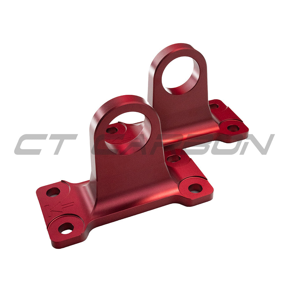 Red aluminum tow hooks for Land Rover Defender L663 90/110/130, accessory by CT Carbon, shown mounted on the vehicle.