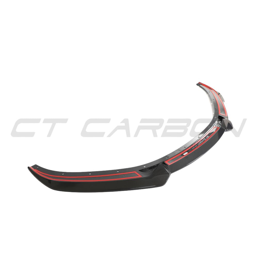Lotus Emira full carbon fibre kit front splitter by CT Design, showcasing sleek, lightweight carbon fibre with detailed finish.