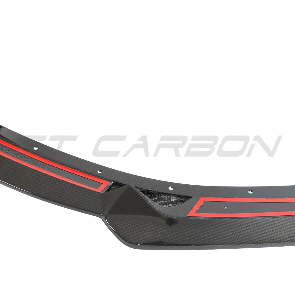 Lotus Emira full carbon fibre kit front splitter by CT Design, showcasing sleek, lightweight carbon fiber with detailed finish.