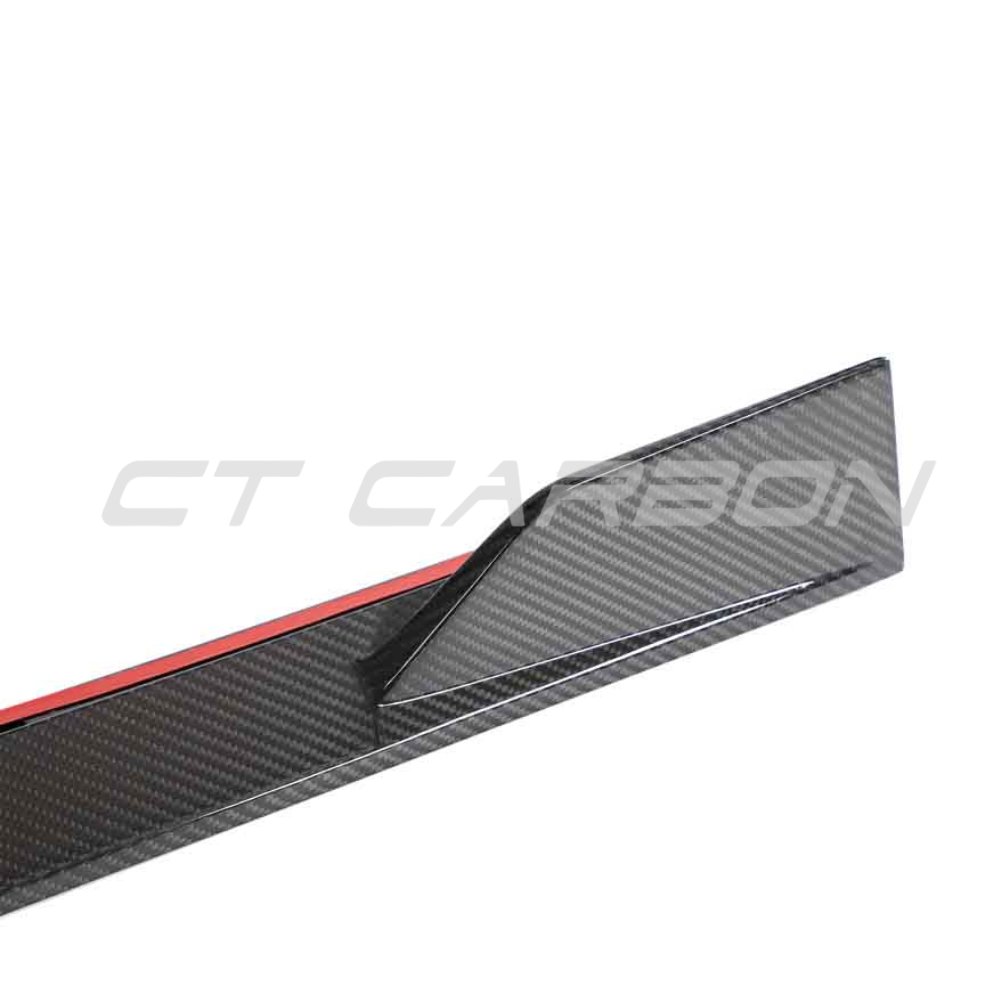 Lotus Emira full carbon fiber side skirts kit by CT Design showing sleek, lightweight carbon fiber side panels with detailed weave pattern.