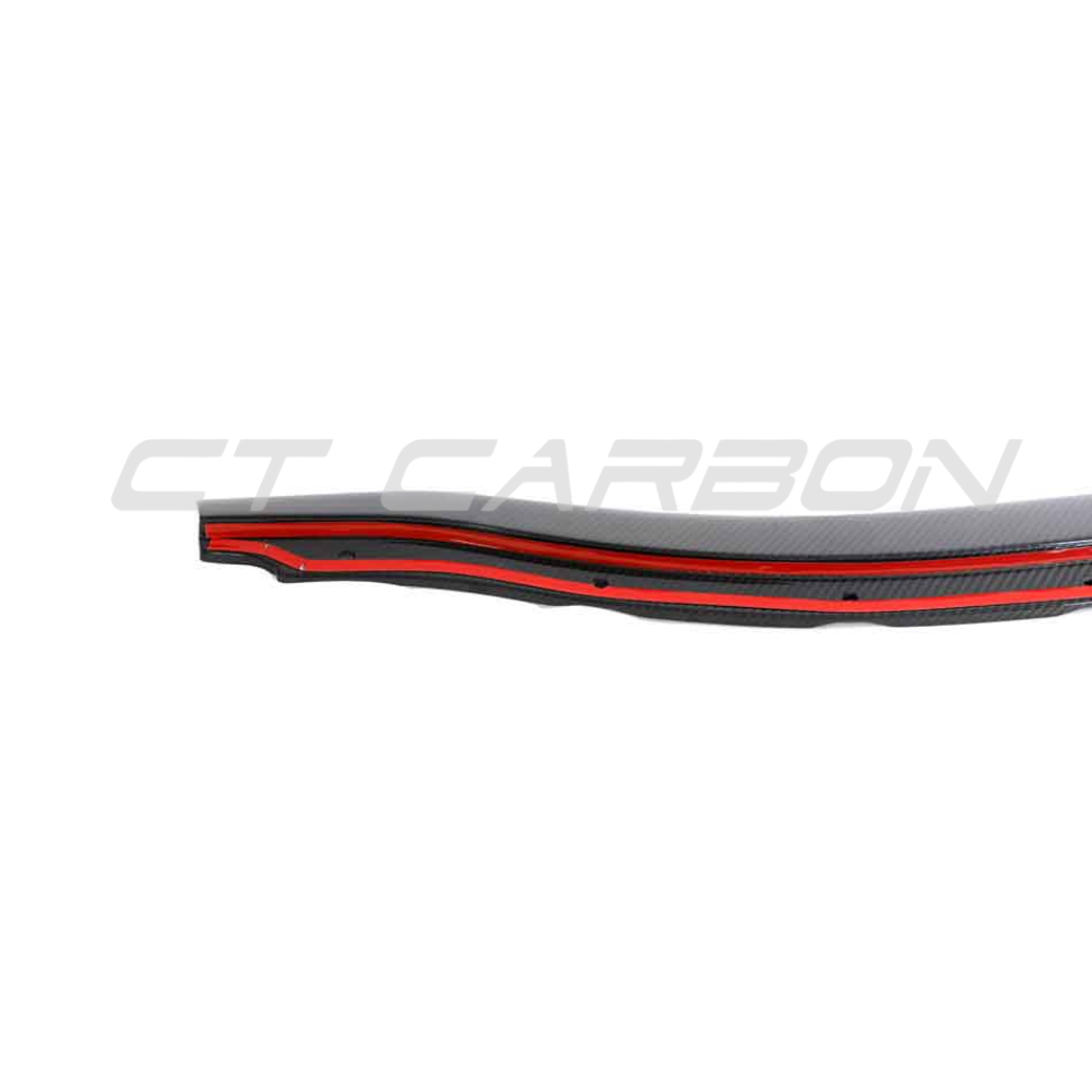 Lotus Emira carbon fibre side skirts by CT Design, featuring sleek aerodynamic design and lightweight carbon fibre material.