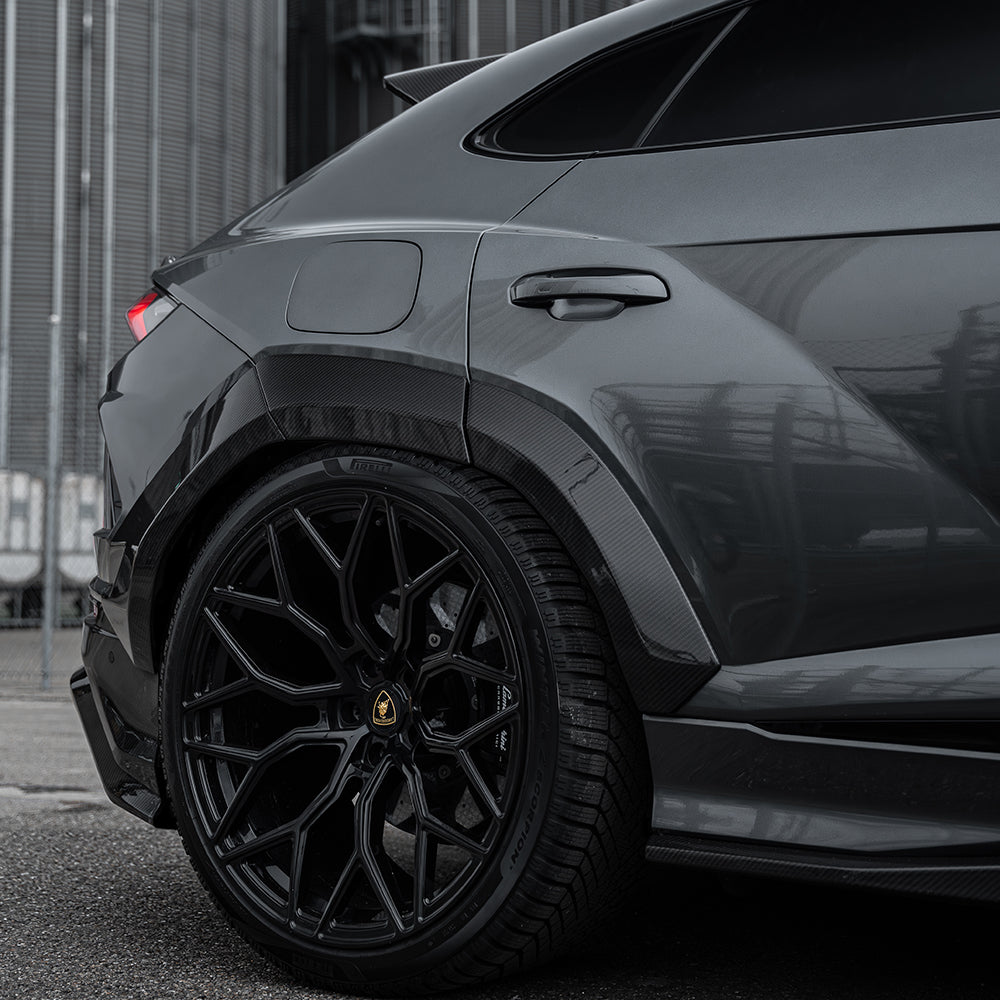 Lamborghini Urus with CT Carbon full wide arch kit featuring carbon fibre finish and sporty wide wheel arches.