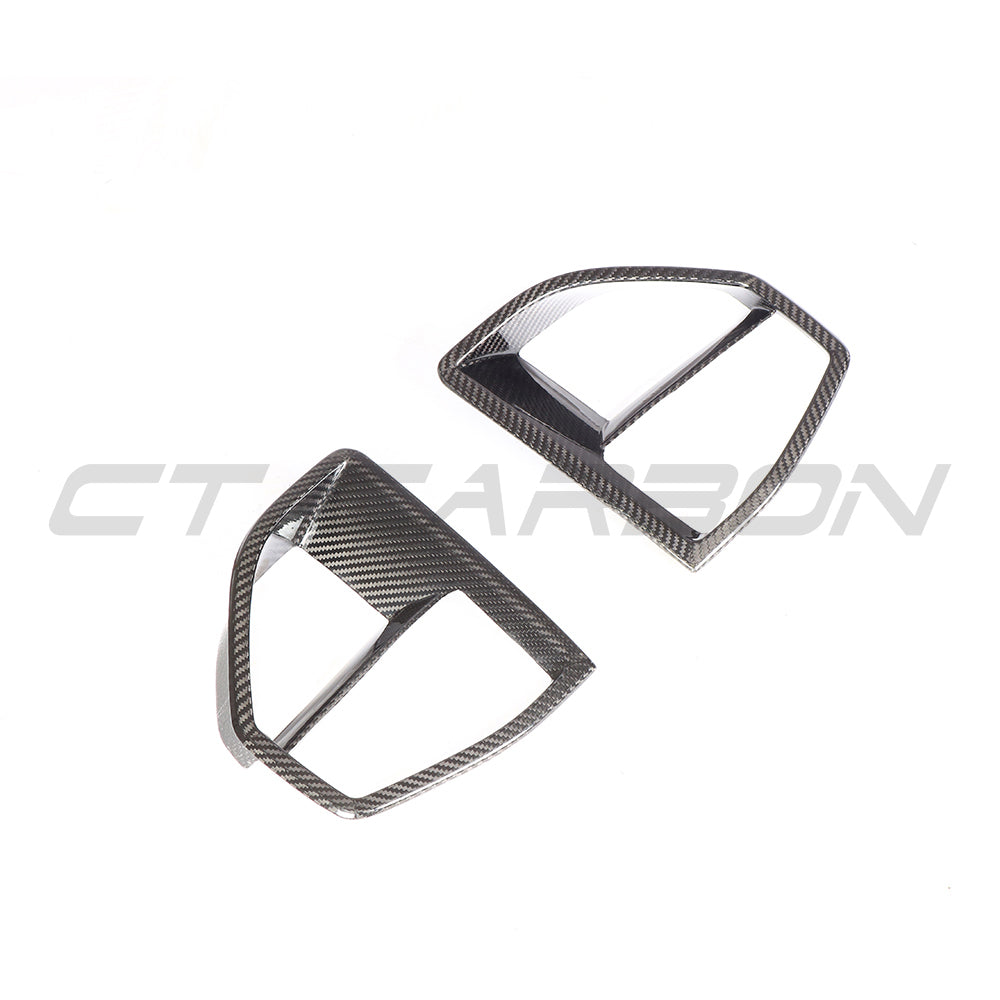 BMW G05 X5 2019-2023 carbon fibre front vent add-on accessory by CT Carbon, showcasing sleek carbon fibre design on vehicle front.