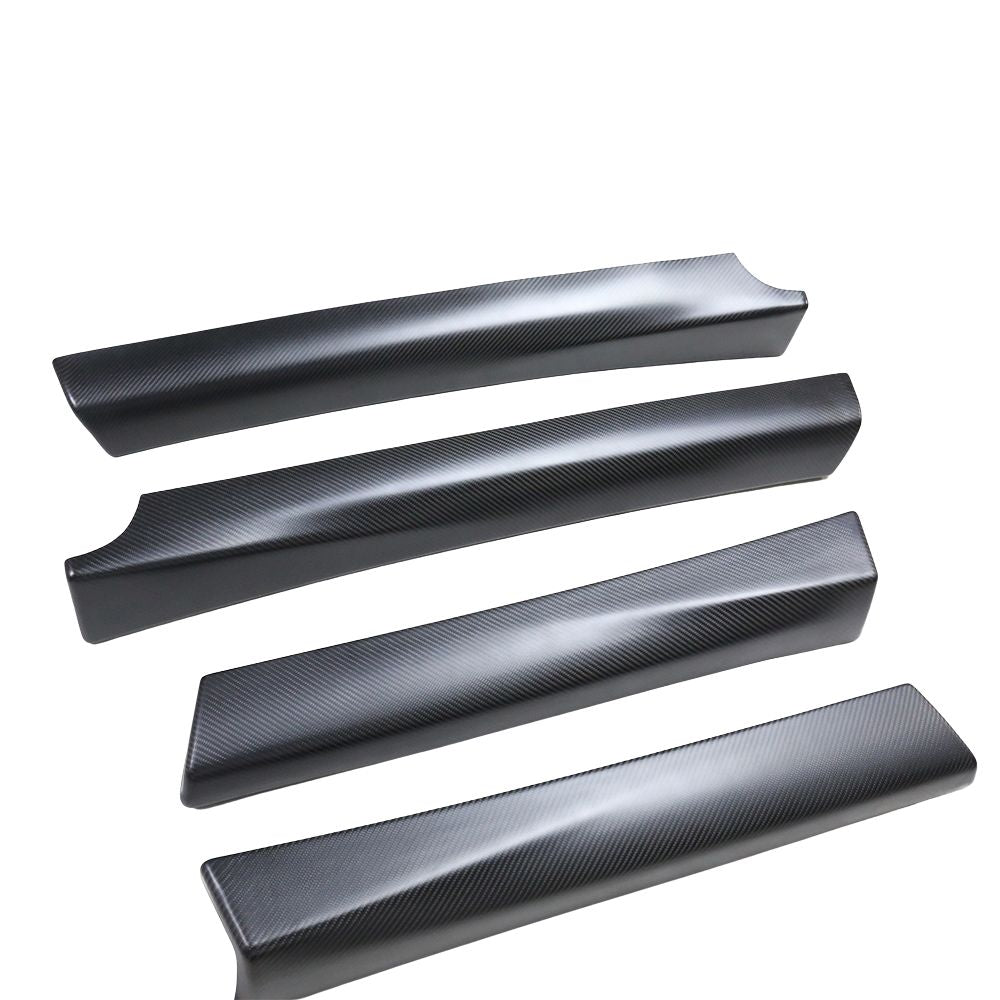 Tesla Model 3 2017-2023 carbon fiber interior door panel trim accessory by CT Carbon, showcasing sleek, textured finish.