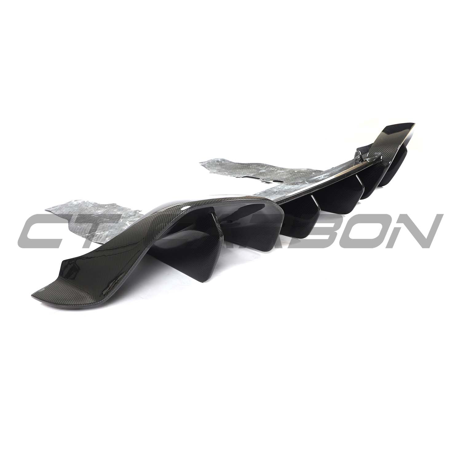 CT Carbon McLaren 720S full carbon kit showing sleek carbon fiber body panels and aerodynamic design details.