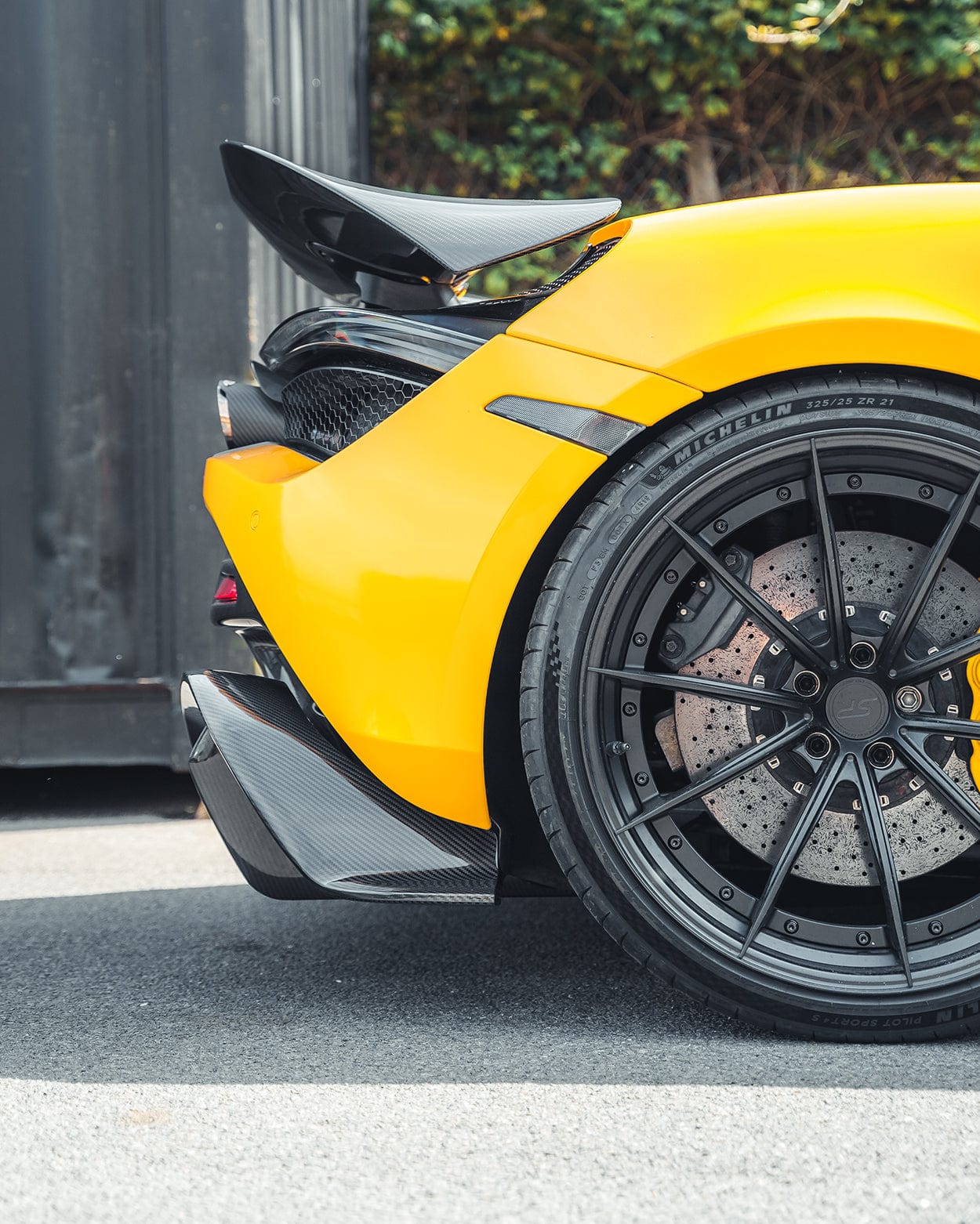 MCLAREN 720S carbon fibre spoiler by CT Design, showing sleek aerodynamic design and lightweight carbon fibre material.