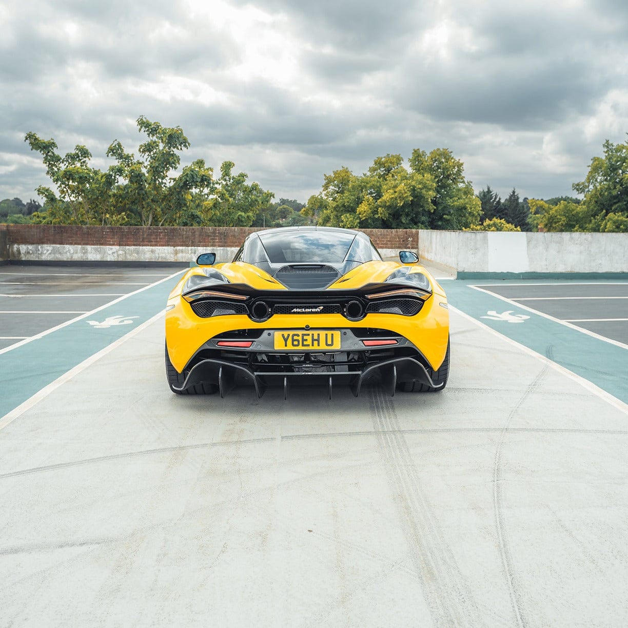 MCLAREN 720S full carbon body kit by CT Design V2, showcasing carbon fiber panels and aerodynamic design details.