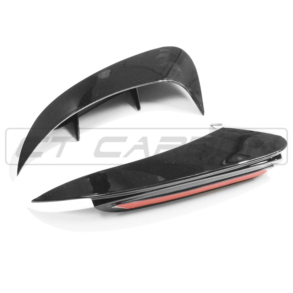 Mercedes A-Class A35 V177 gloss black rear bumper corners by CT Carbon, close-up showing sleek, aerodynamic accessory details.