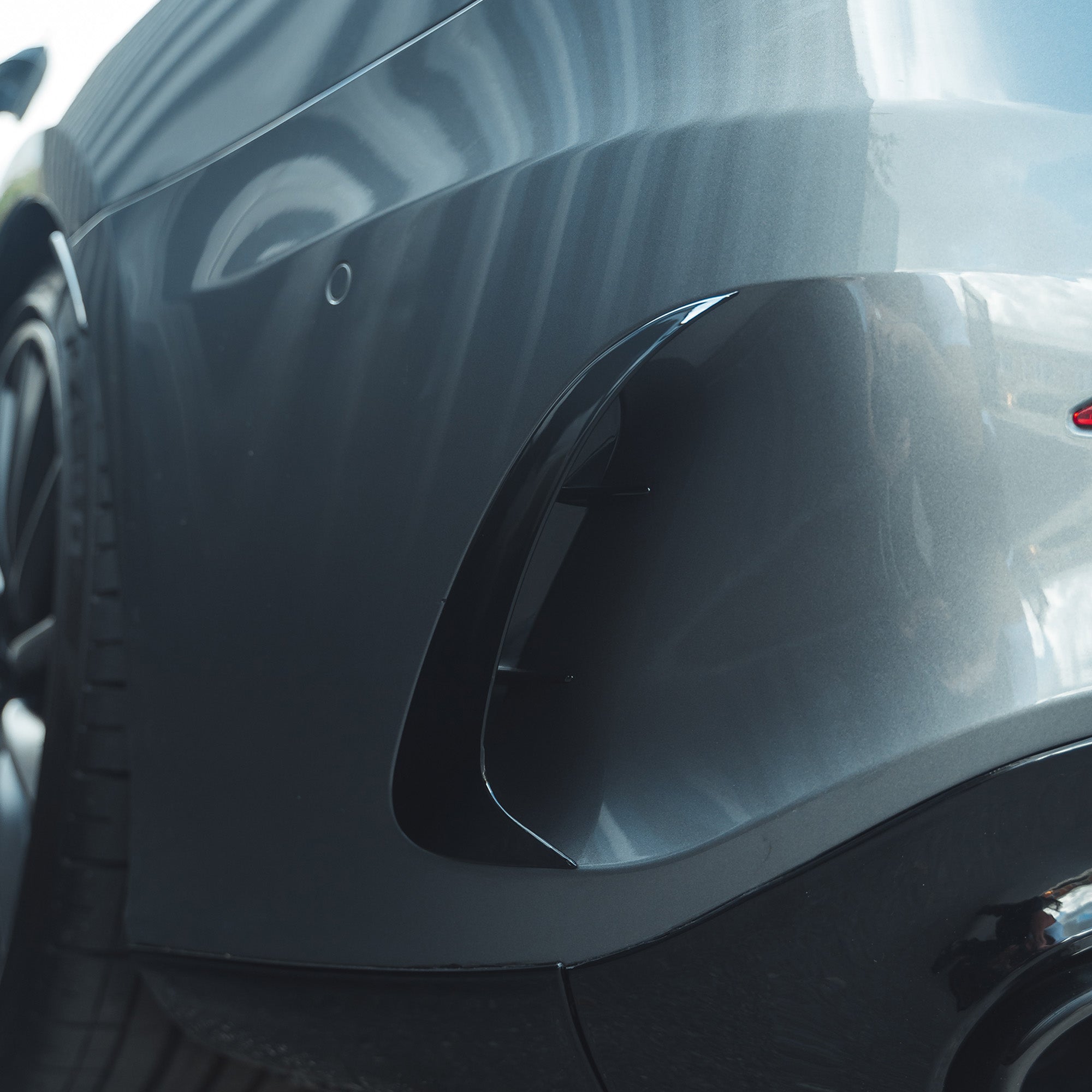 Mercedes A-Class A35 V177 gloss black rear bumper corner accessories by CT Carbon, showing close-up of the fitted bumper corners.