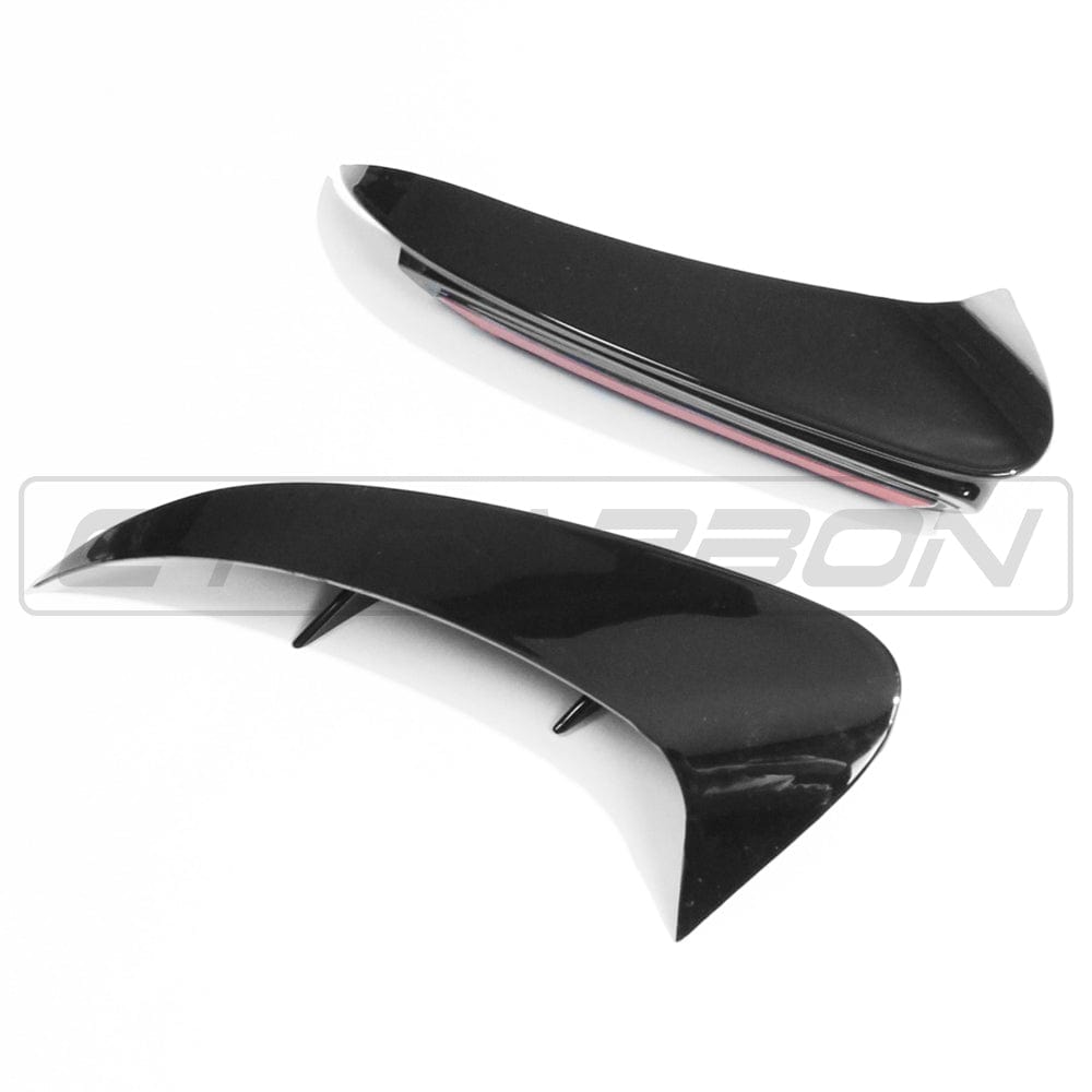 Mercedes A-Class A35 V177 gloss black rear bumper corners by CT Carbon, close-up of sleek automotive accessory details.