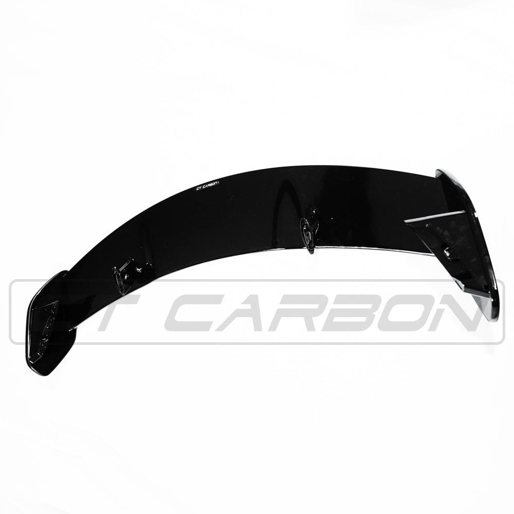 Mercedes A-Class W177 2018-current gloss black CT Carbon spoiler wing mounted on car's rear for sporty style.
