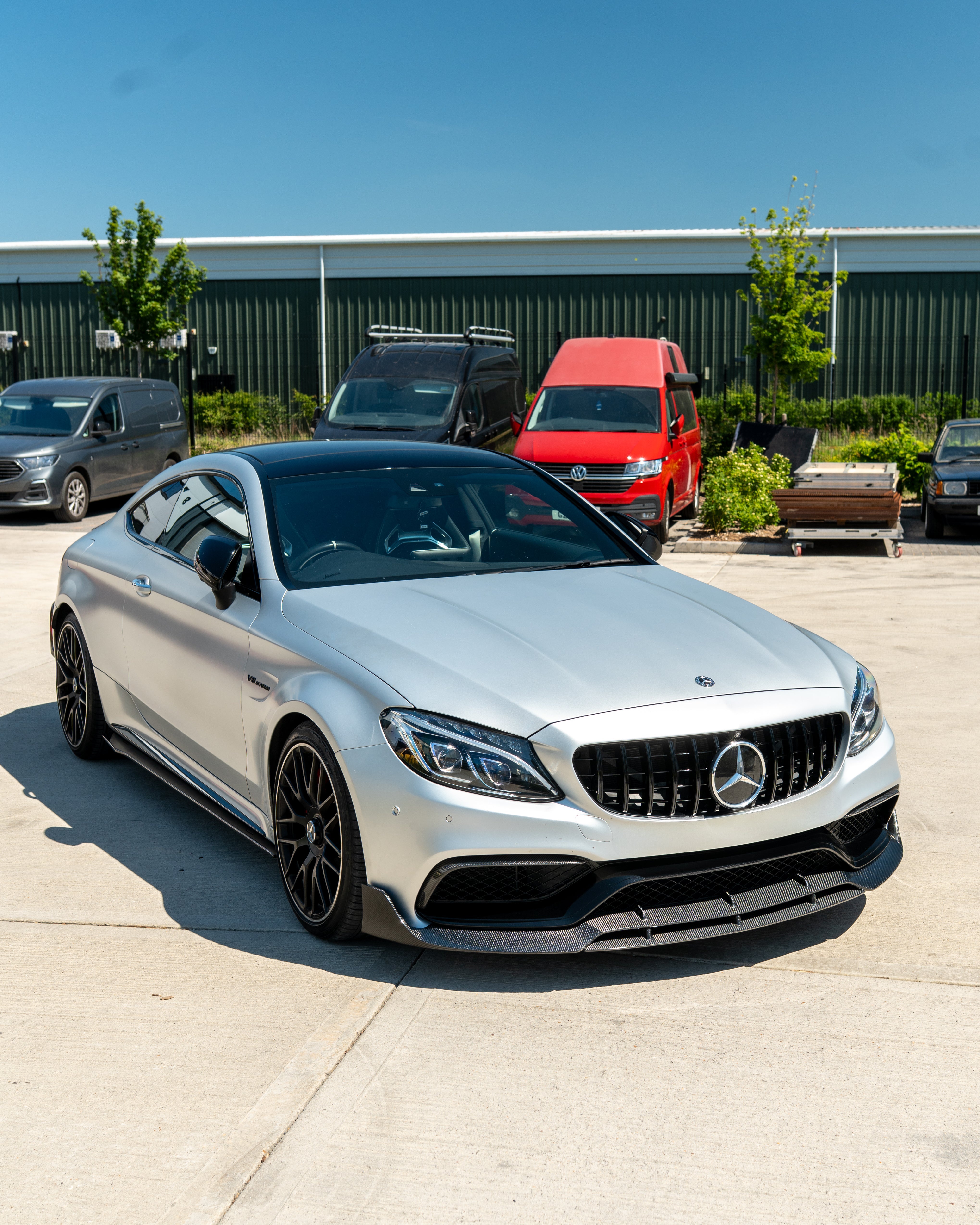 Mercedes W205 C63 and C63S coupe and saloon carbon side skirts by CT Carbon, featuring sleek carbon fiber finish.