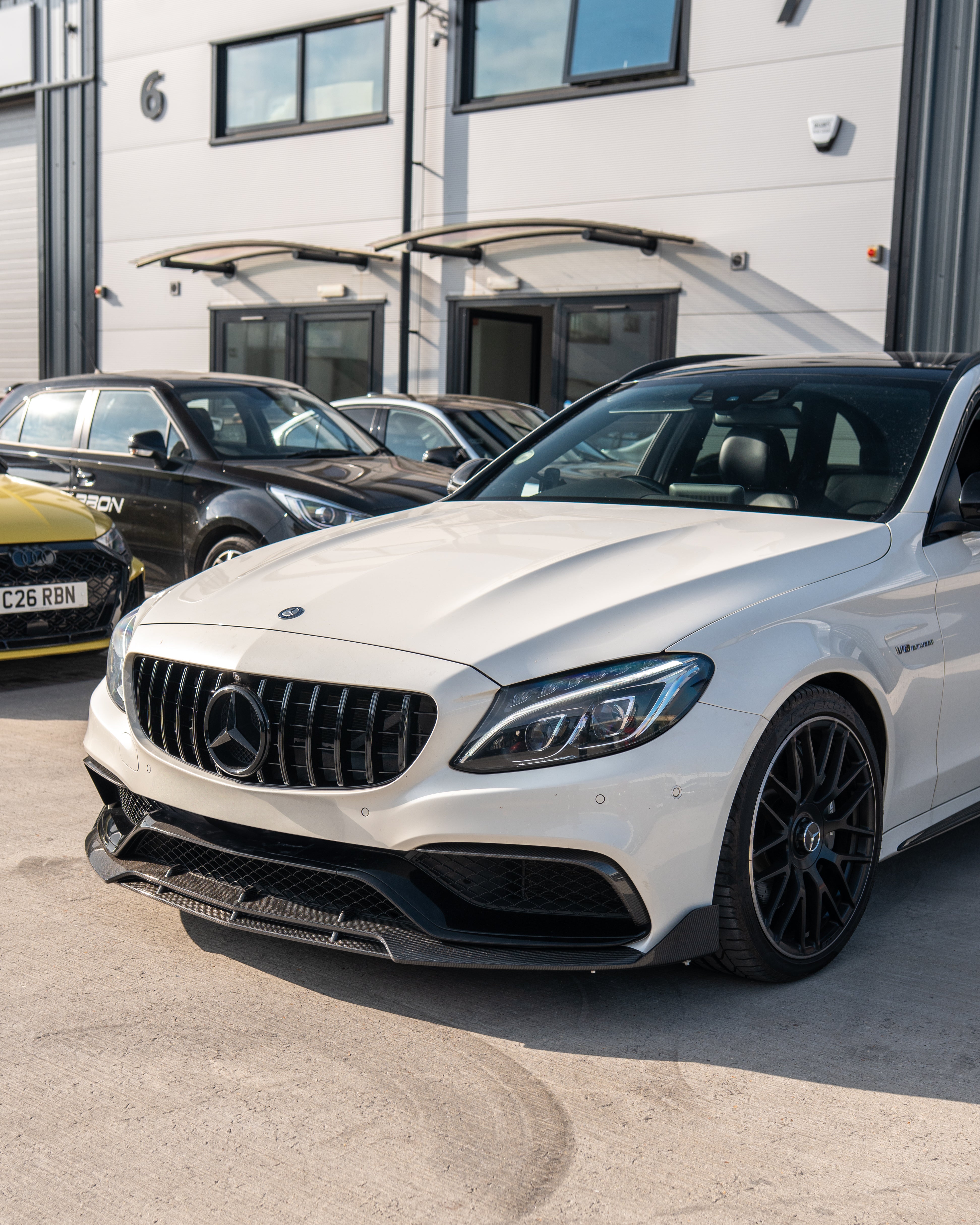 Mercedes W205 C63 AMG 2014-2018 black grille with camera, carbon fiber style, designed for AMG GT models by CT Carbon.
