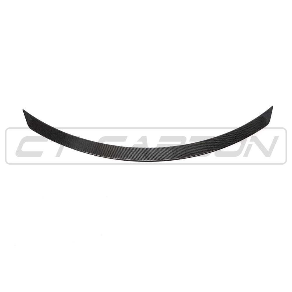 Mercedes C63 W205 convertible carbon spoiler by CT Carbon, V2 style, shown on the car's rear exterior.